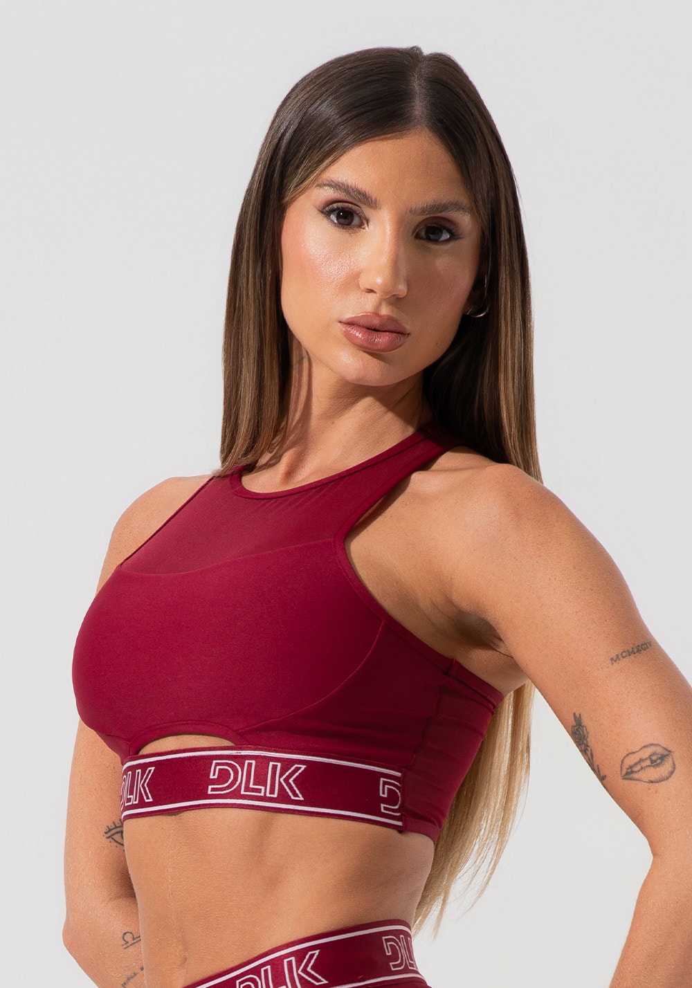 Top fitness feminino com elástico na base e tule activity dlk vinho