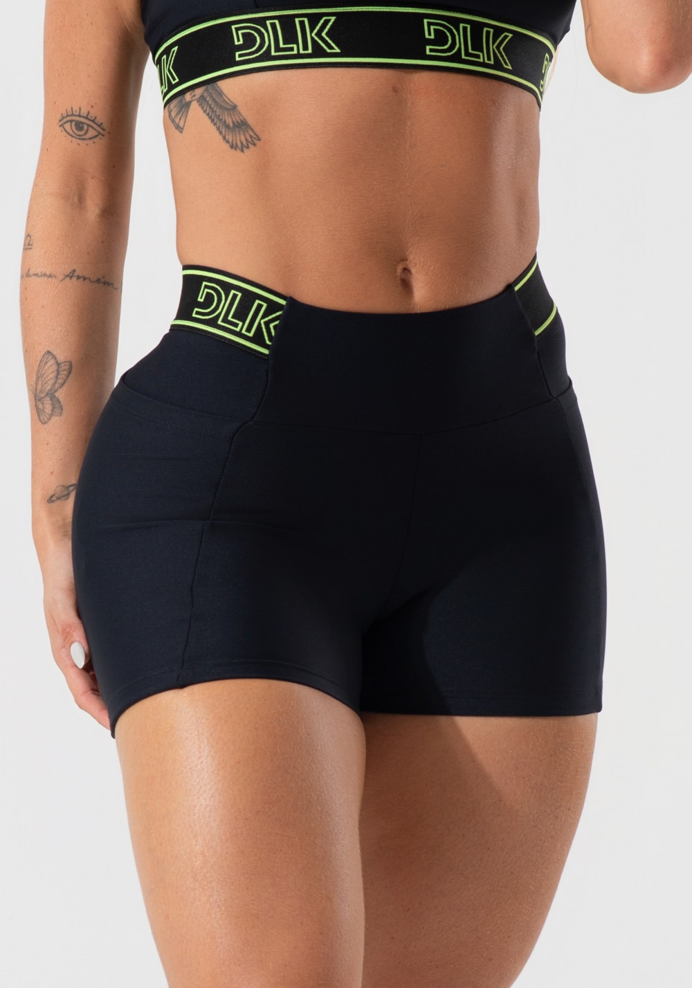 Short fitness feminino com bolsos e elástico no cós activity dlk preto