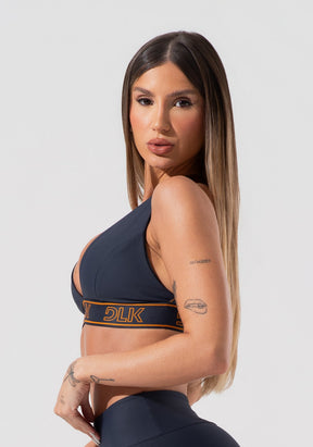 Top fitness feminino com bojo e alças cruzadas de elástico activity dlk grafite