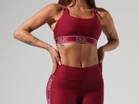 Bermuda fitness feminina com elástico largo lateral activity dlk vinho