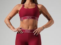 Short fitness feminino com elástico no cós e tule lateral activity dlk vinho